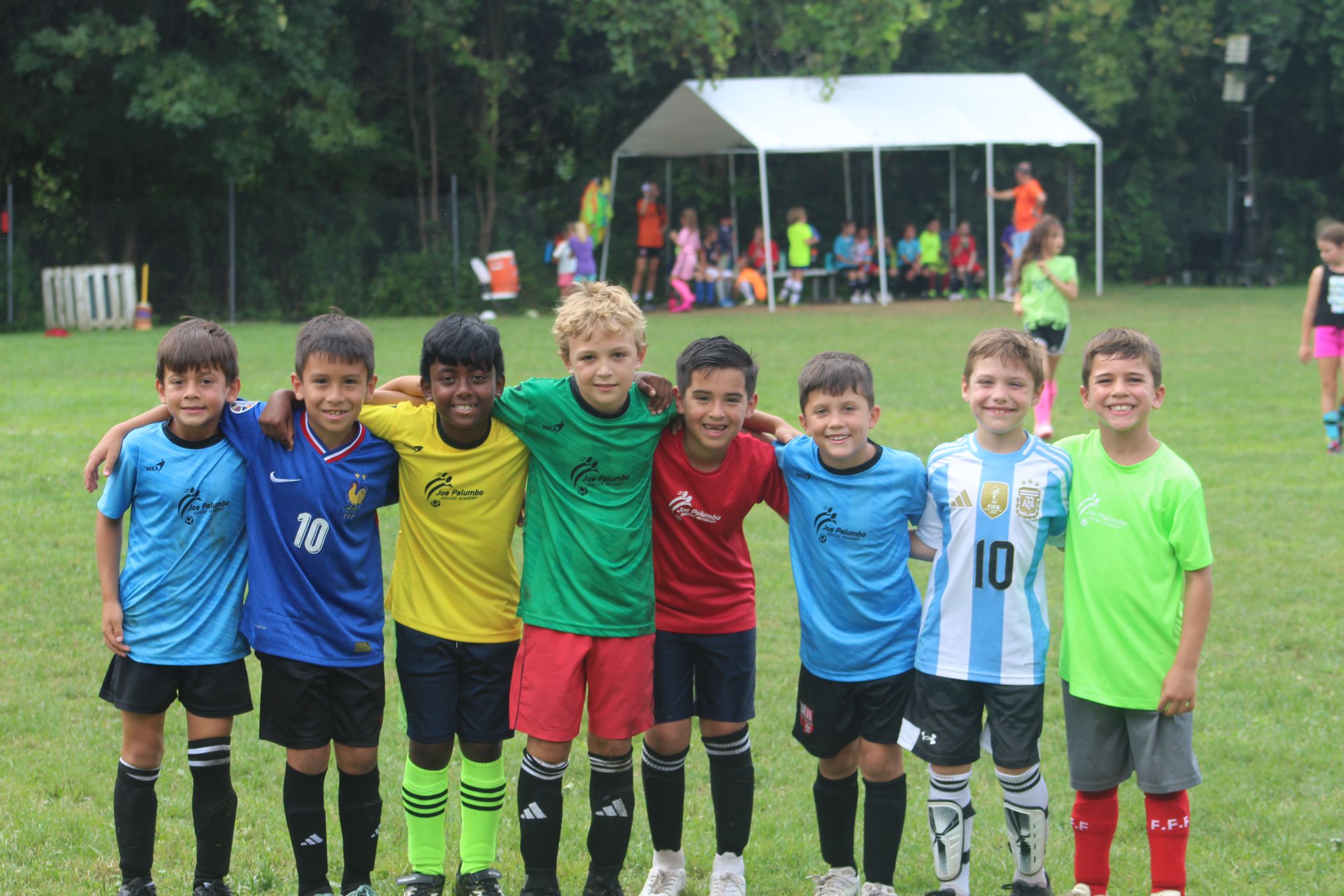 Juniors Kids together enjoying summer camp activities at Joe Palumbo Soccer Academy.